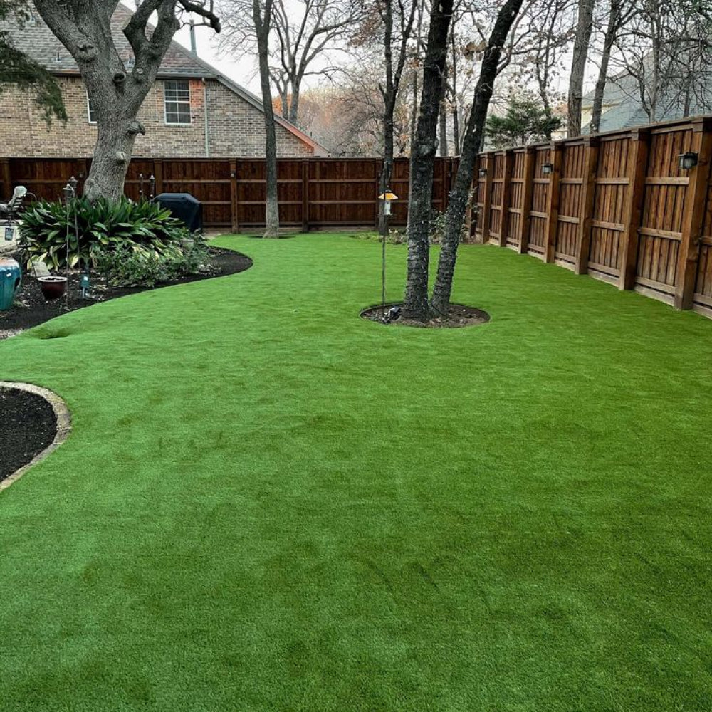 Lush green artificial grass in a backyard 