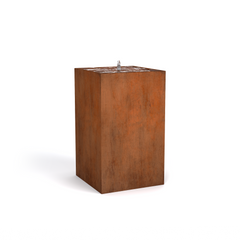 A rectangular corten steel water fountain with a spout on the top edge, displaying a rust-like brown finish.