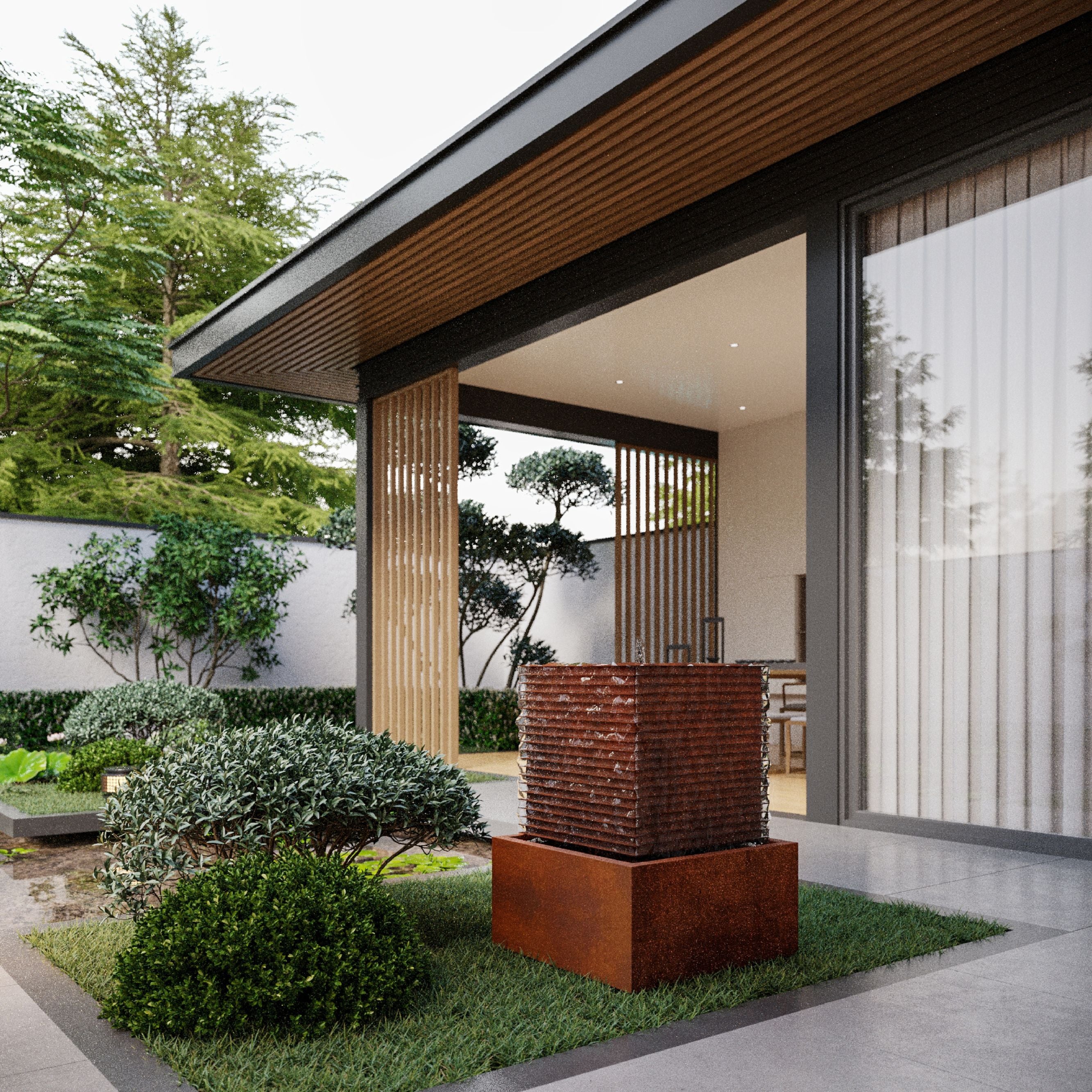 Modern house exterior with a garden and decorative Mac Landscape's Davy water fountain