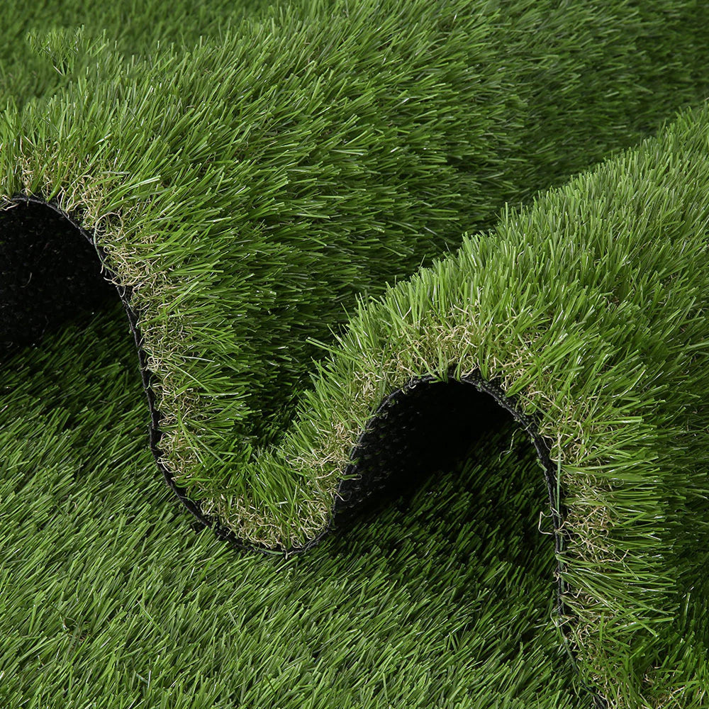 Roll of artificial grass with a textured surface