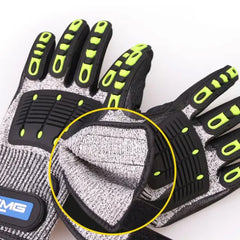 Black and gray gloves with green accents on a white background